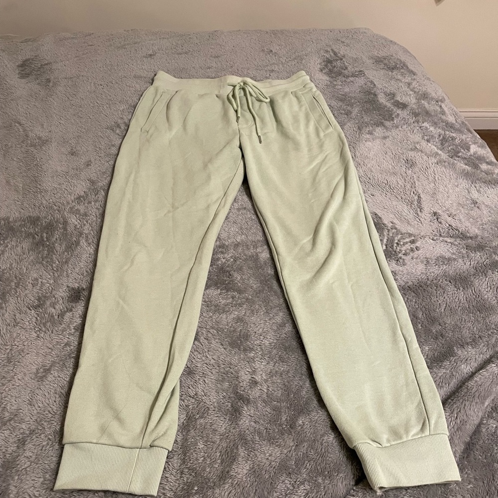 Green sweatpants